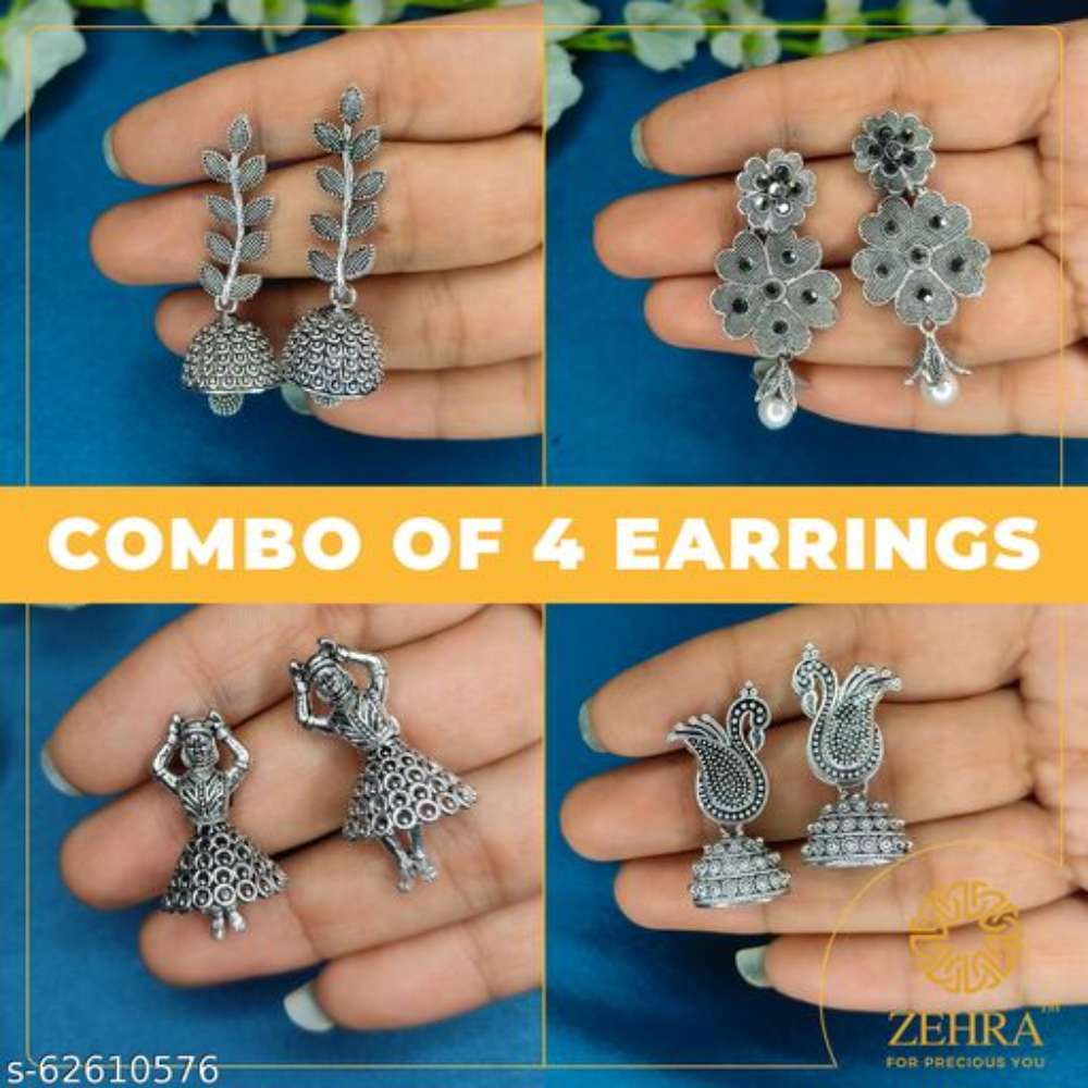 Combo of four silver look like drop earring , small flower earring , peacock earring and doll shaped earrings